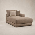 Aurelia One-Arm Chaise Module in Coffee on a clean stone studio background