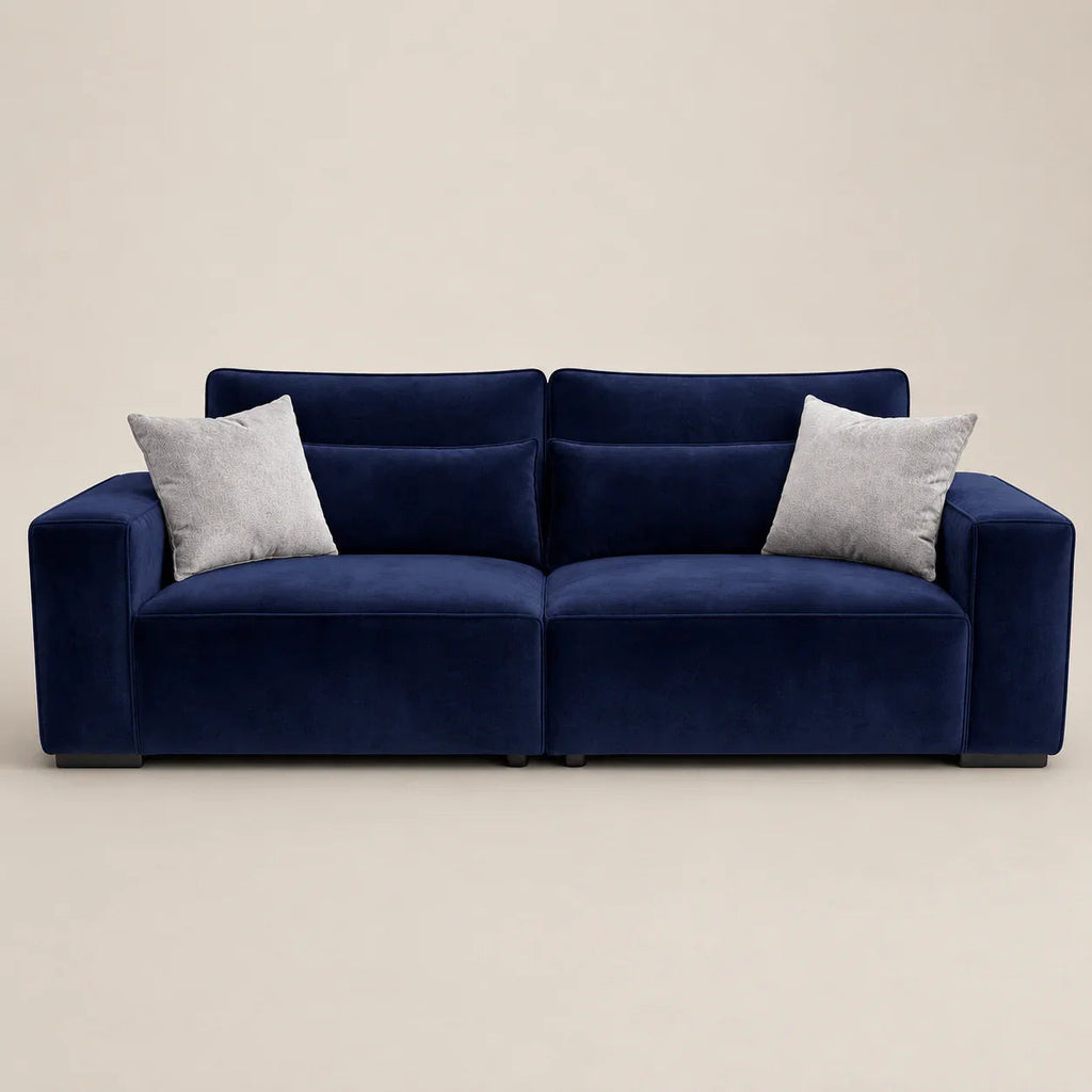 Luxury navy velvet sofa with grey cushions, modern design for living room comfort