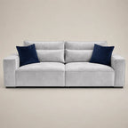 Luxury gray velvet sofa with navy blue cushions, modern design for living room comfort