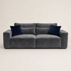 Luxury grey velvet sofa with navy blue cushions, modern design for living room comfort