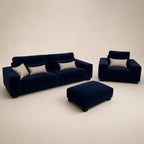 Luxury navy velvet sofa set with matching armchair and ottoman, perfect for modern living rooms.