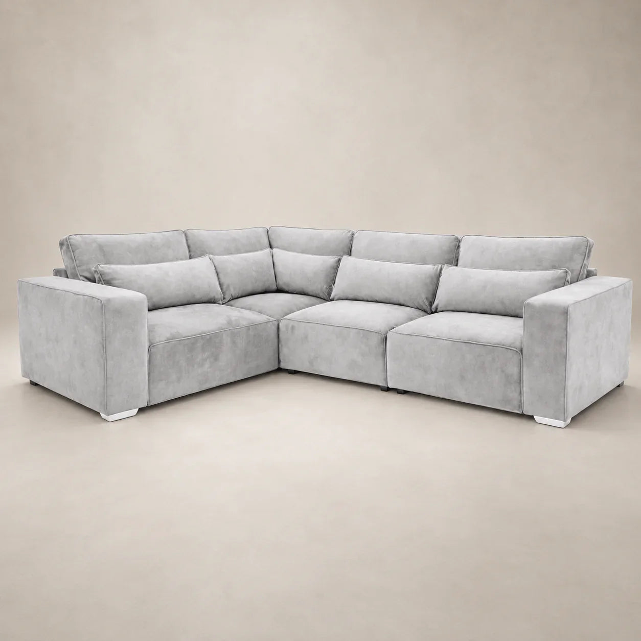 Luxury grey velvet corner sofa with plush cushions, modern design for living room comfort