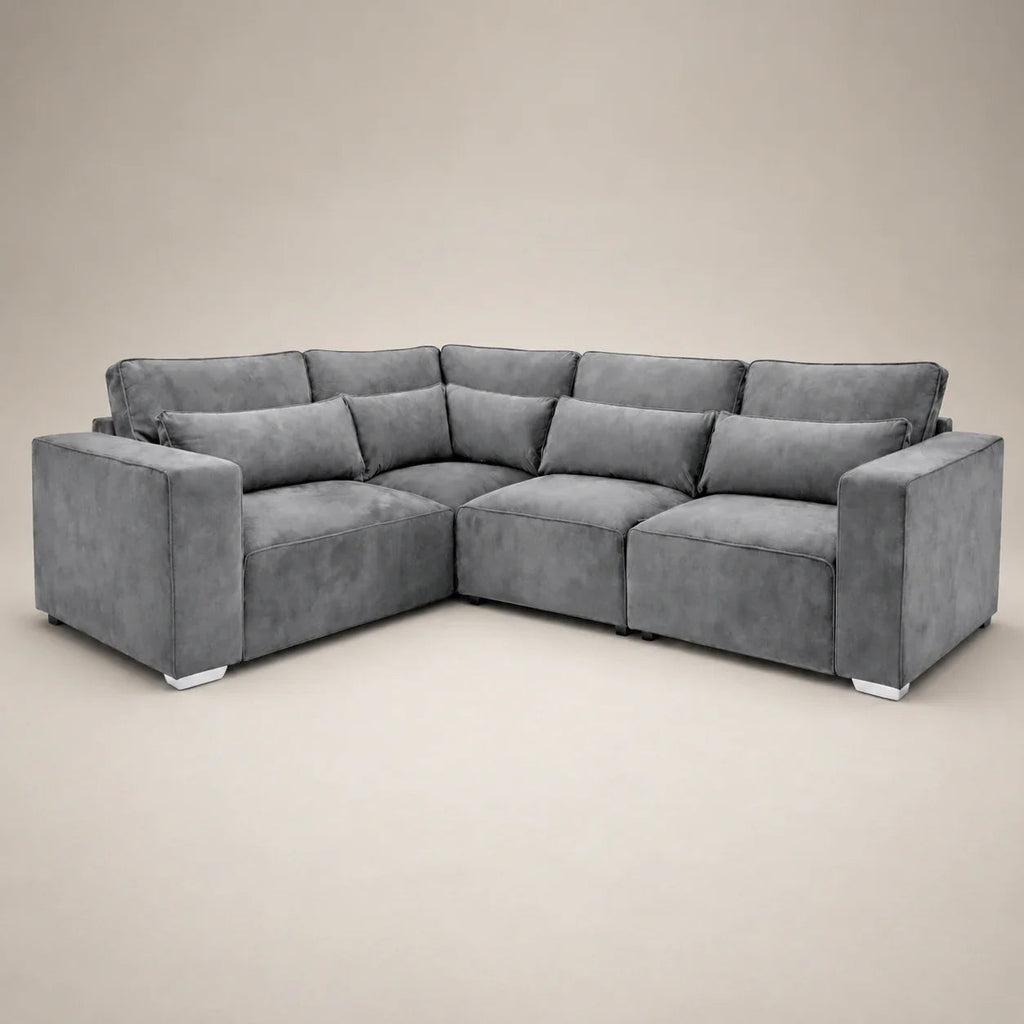 Grey velvet corner sofa with plush cushions, modern luxury living room furniture
