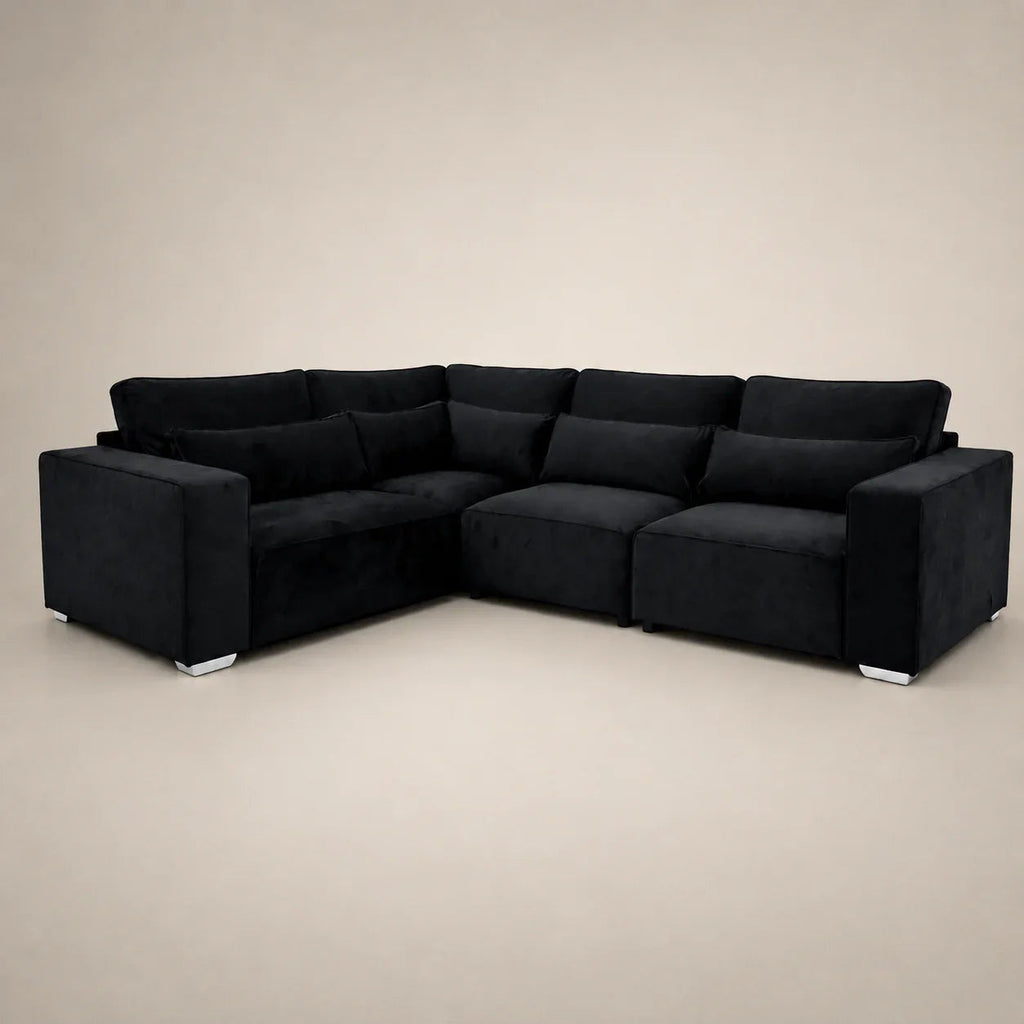 Black velvet L-shaped sectional sofa with modern design and white feet, ideal for luxury living rooms