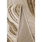 Luxury beige area rug with swirling brown pattern and stitched edge, perfect for modern living rooms.