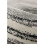 Soft grey and cream striped area rug with plush texture for living room or bedroom