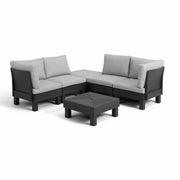 Modern outdoor sectional sofa with gray cushions and matching coffee table for patio or garden use