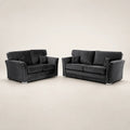 Luxury black velvet sofa set with studded arms and matching cushions, perfect for modern living rooms.