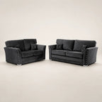 Luxury black velvet sofa set with studded arms and matching cushions, perfect for modern living rooms.