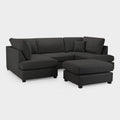 Modern black U-shaped corner sofa with chaise and ottoman on white background
