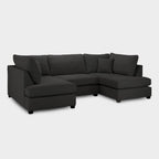 Modern black U-shaped corner sofa with plush cushions on a white background