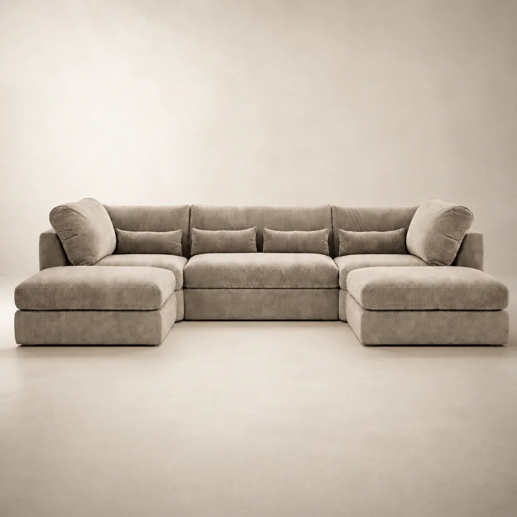 Luxury beige sectional sofa with chaise lounges and plush cushions, ideal for modern living rooms