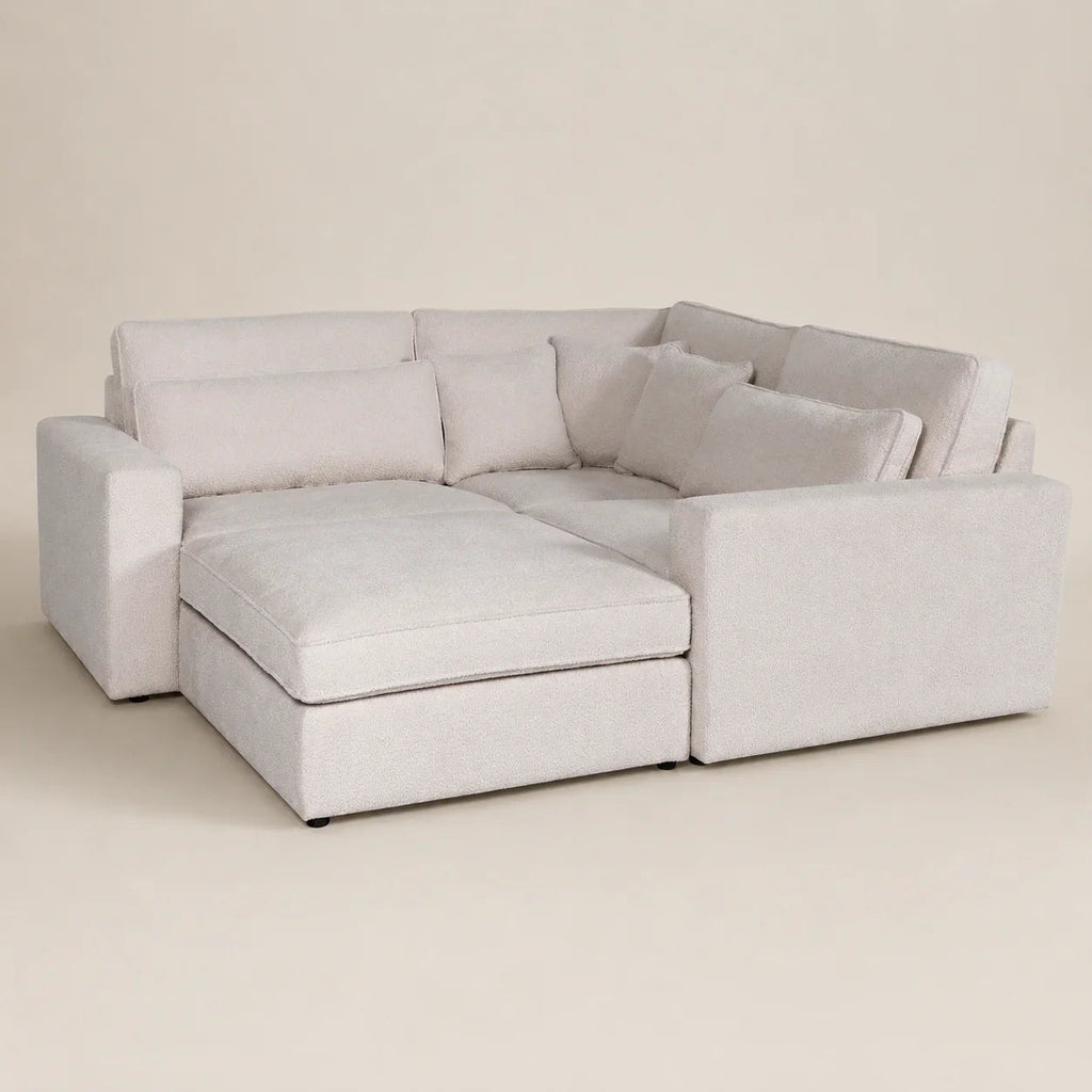 Luxury light grey sectional sofa with chaise and plush cushions, ideal for modern living rooms