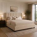Luxury beige upholstered bed with tufted headboard in elegant bedroom, perfect for UK homes