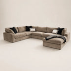 Luxury beige sectional sofa with black and white pillows, perfect for modern living rooms