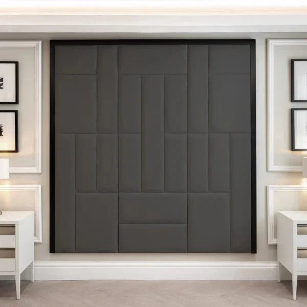 Shadow grey abstract headboard with geometric panel design, framed by bedside tables and lamps