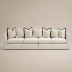 Luxury beige sofa with black-trimmed pillows, modern design for living room comfort