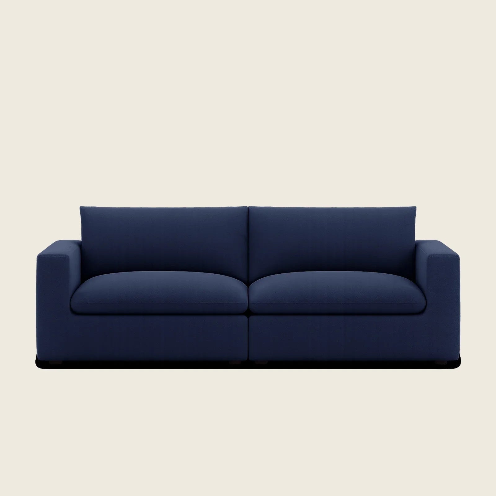Navy blue modern two-seater sofa with clean lines and plush cushions, ideal for luxury living rooms.
