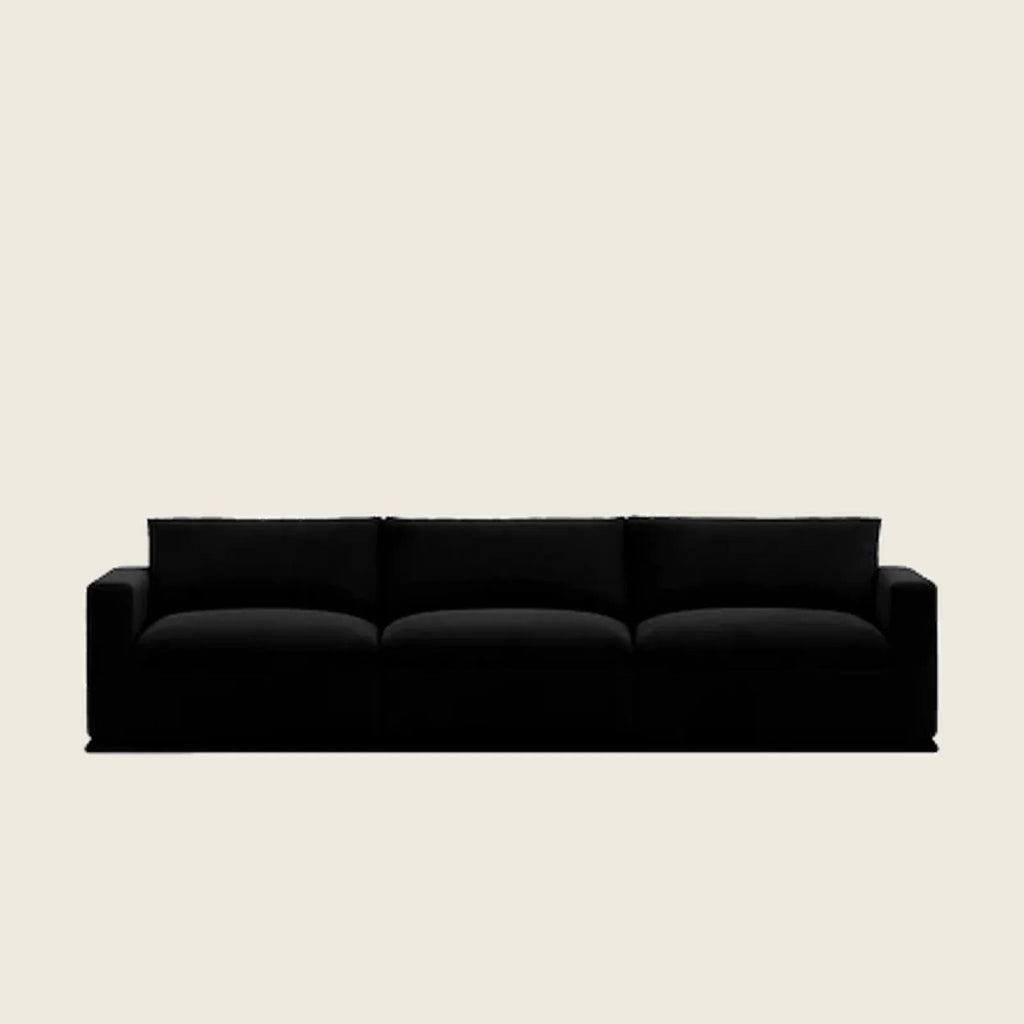 Black three-seater luxury sofa with plush cushions, modern design for living room comfort
