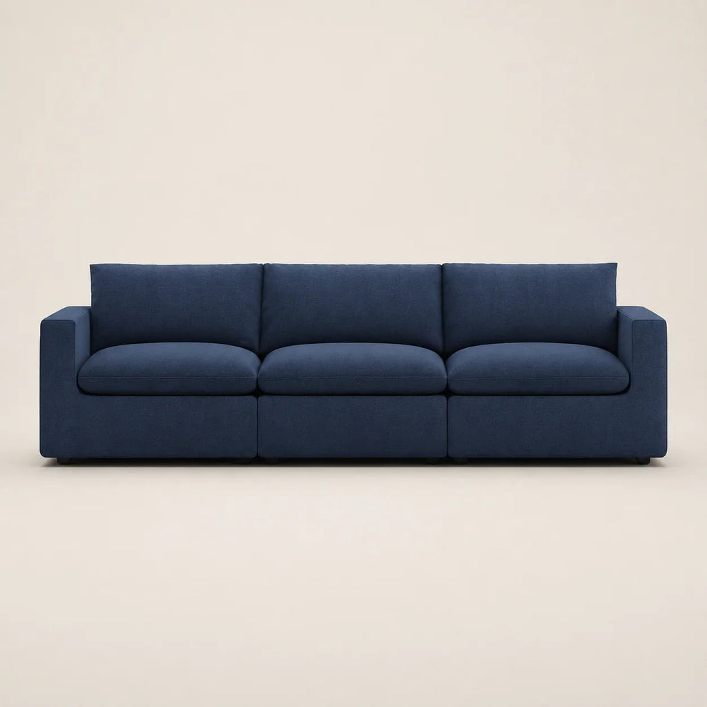 Navy blue modern 3-seater sofa with clean lines and plush cushions, ideal for luxury living rooms