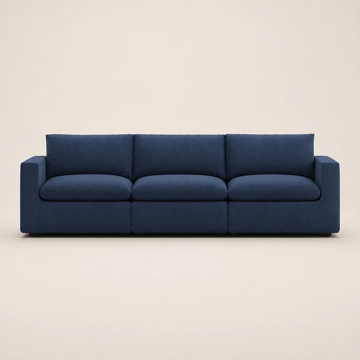 Navy blue modern 3-seater sofa with clean lines and plush cushions, ideal for luxury living rooms