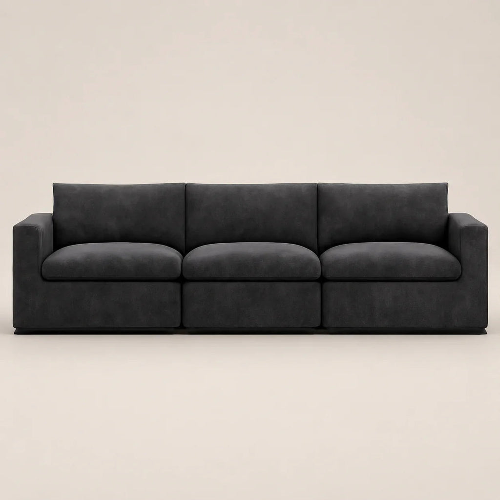 Luxury dark grey three-seater sofa with modern design, perfect for contemporary living rooms