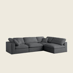 Dark gray L-shaped sectional sofa with plush cushions, ideal for modern living rooms