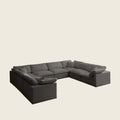 Large grey L-shaped sectional sofa with plush cushions, ideal for luxury living rooms