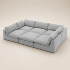Modern light gray modular sectional sofa with plush cushions, ideal for luxury living rooms