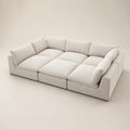 Modern beige sectional sofa with plush cushions, ideal for luxury living room furniture