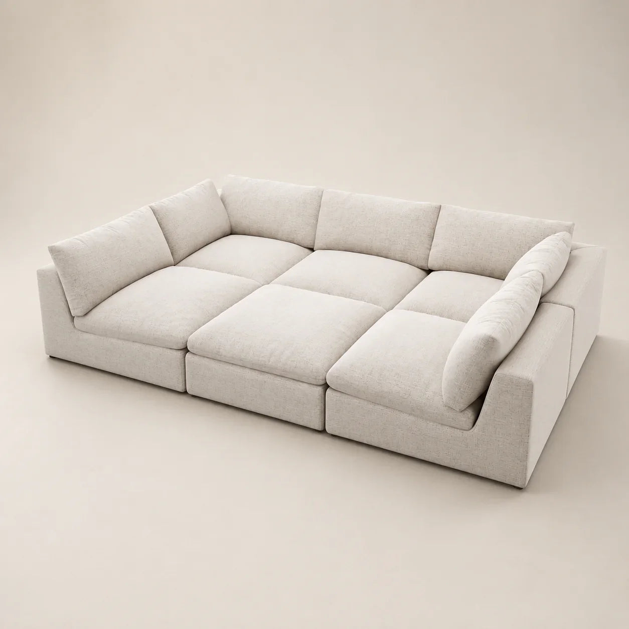 Modern beige sectional sofa with plush cushions, ideal for luxury living room furniture