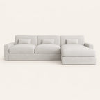 Luxury light gray sectional sofa with chaise lounge and matching cushions, modern minimalist design