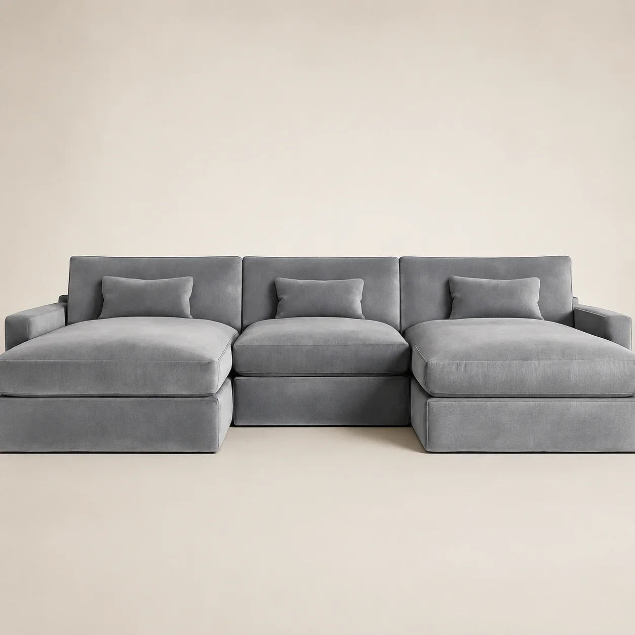 Luxury grey velvet sectional sofa with chaise lounges and plush cushions for modern living rooms