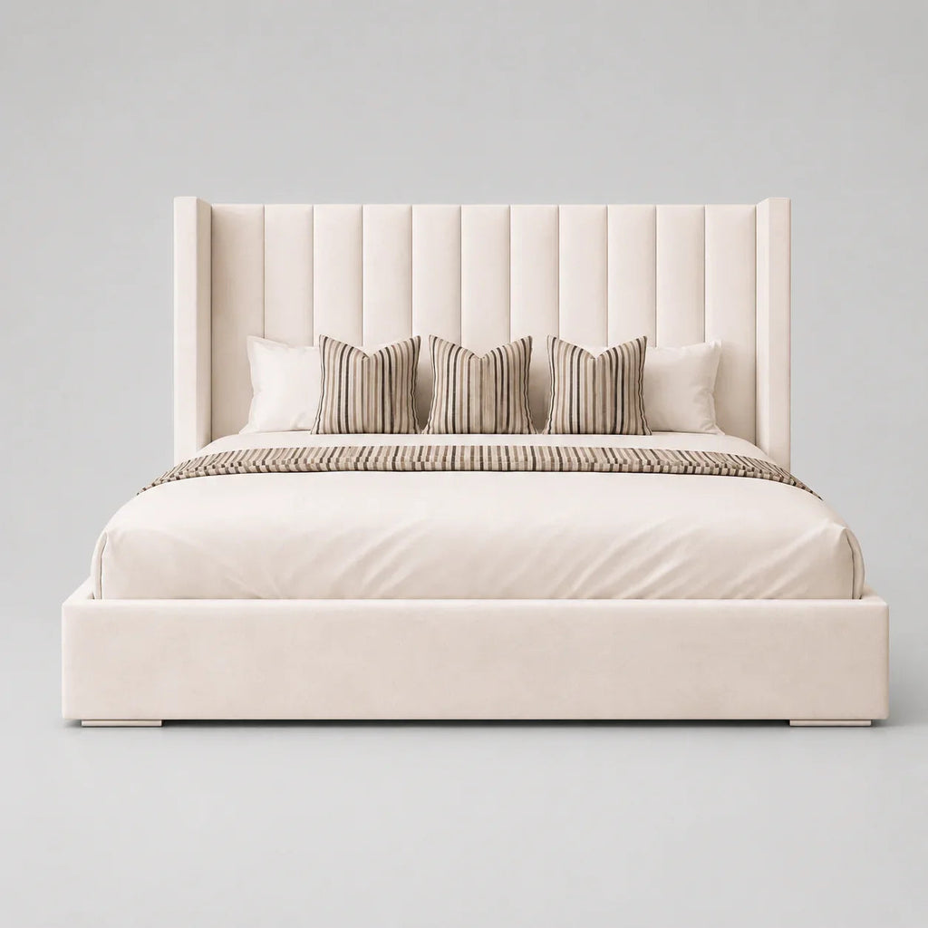 Luxury upholstered bed with tufted headboard, striped pillows, and neutral bedding for modern bedrooms