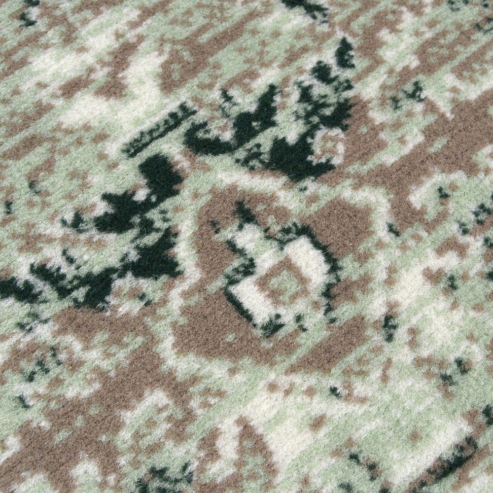 Mint green and brown patterned area rug with geometric design, ideal for living room or bedroom decor