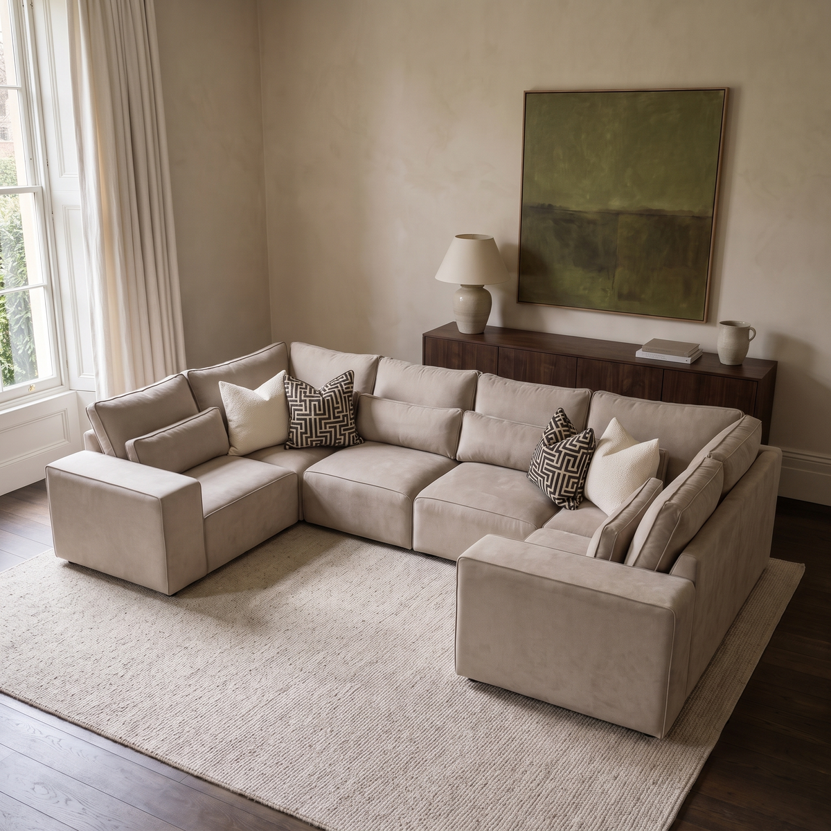 Maison Closed-End U-Shape Sofa viewed from above in a warm neutral living room