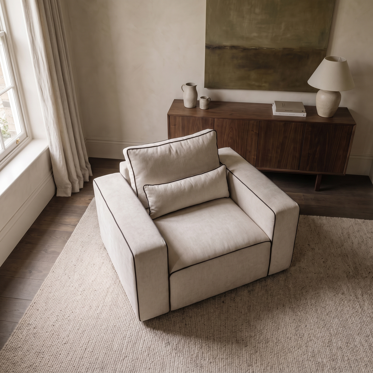Maison Armchair from an elevated camera angle showing the seating layout and fabric