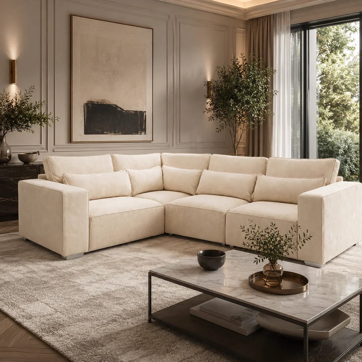 Luxury beige sectional sofa in modern living room with marble coffee table and abstract art