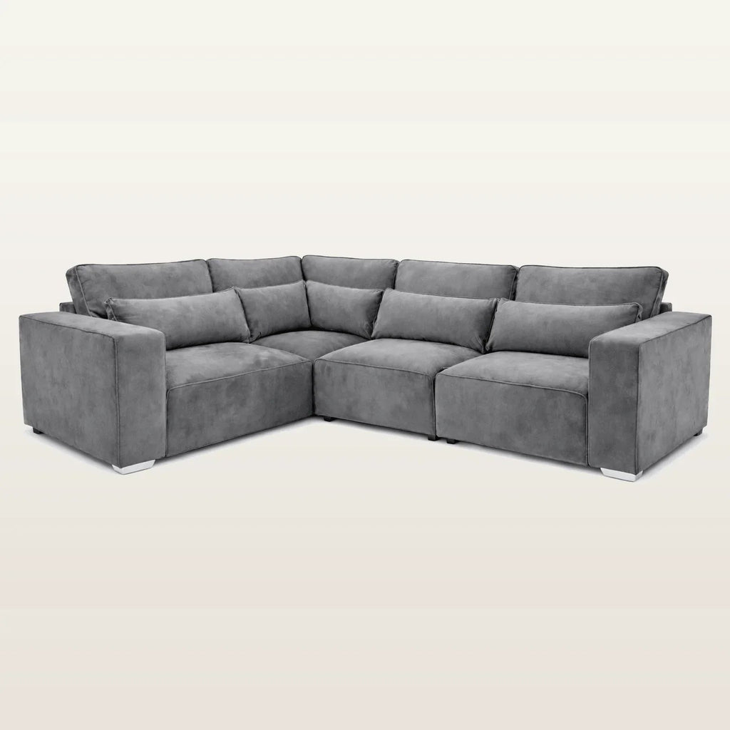 Gray velvet L-shaped sectional sofa with plush cushions and modern design