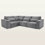 Gray velvet L-shaped sectional sofa with plush cushions and modern design