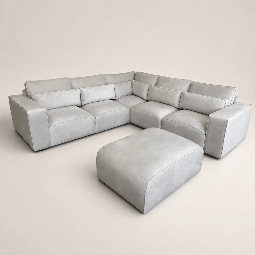 Luxury grey sectional sofa with matching ottoman, modern design for living room comfort