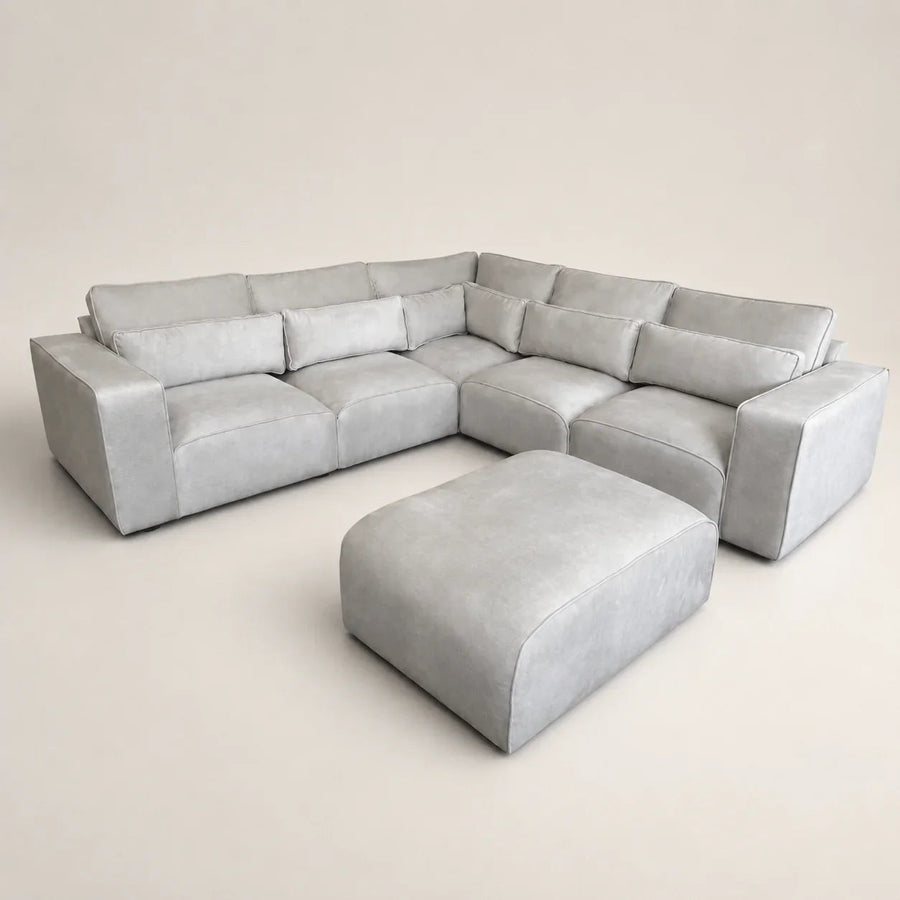 Luxury grey sectional sofa with matching ottoman, modern design for living room comfort