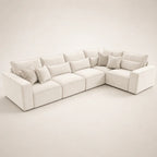 Luxury white sectional sofa with plush cushions and throw pillows, modern living room furniture