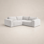 Modern light grey L-shaped sectional sofa with plush cushions, ideal for luxury living rooms