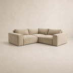 Beige L-shaped sectional sofa with plush cushions, modern luxury living room furniture