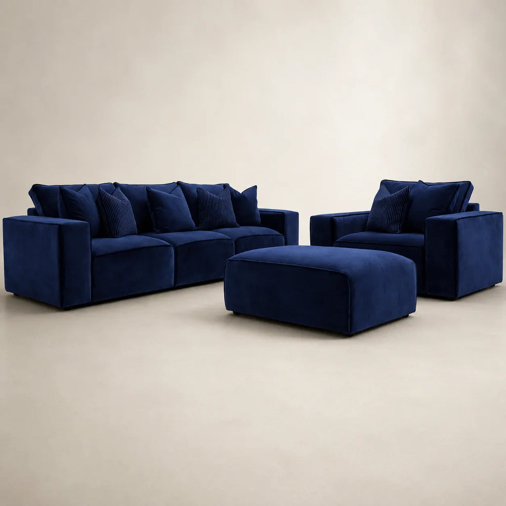 Luxury navy blue velvet sofa set with matching armchair and ottoman for modern living rooms