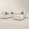 Modern white sectional sofa with black piping, matching armchair and ottoman, luxury living room furniture set
