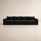 Black modular luxury sofa with plush cushions, modern design for contemporary living rooms