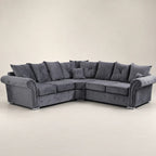 Luxury grey velvet corner sofa with tufted cushions and chrome legs, ideal for modern living rooms