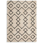 Cream shaggy rug with black geometric diamond pattern, luxury home decor